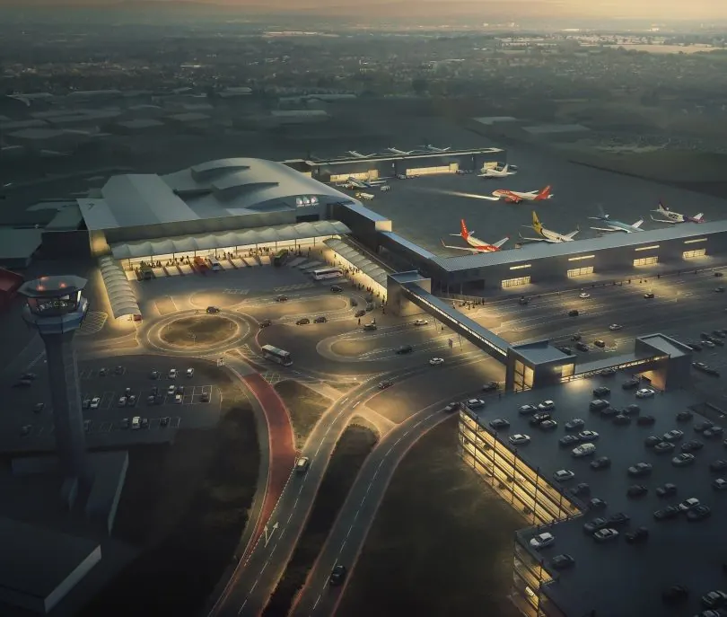 Aerial view of London Luton Airport terminal and car parks at dusk